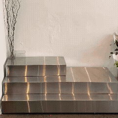 Timelapse of a stainless steel flower display stand being quickly restocked from empty to full.